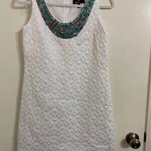 Chic White Dress with Turquoise Accents